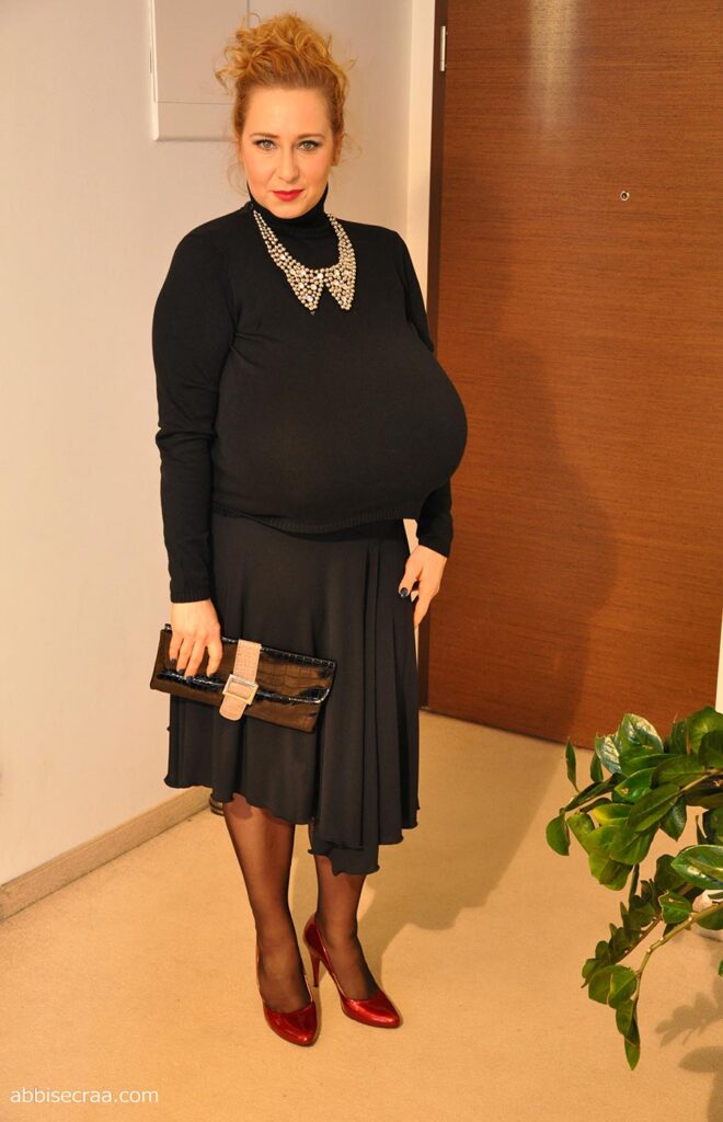 Abbi Secraa huge udders in a black dress